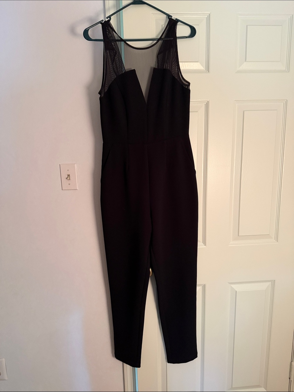 BCBGeneration Black Sleeveless Jumpsuit with Mesh Yoke